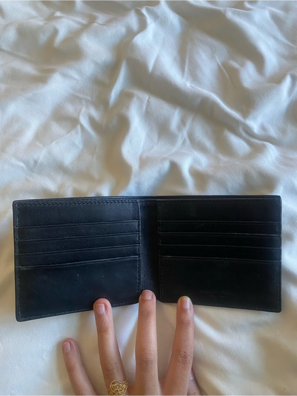 Michael Kors Black Saffiano Leather Bi-Fold Wallet with Silver Logo